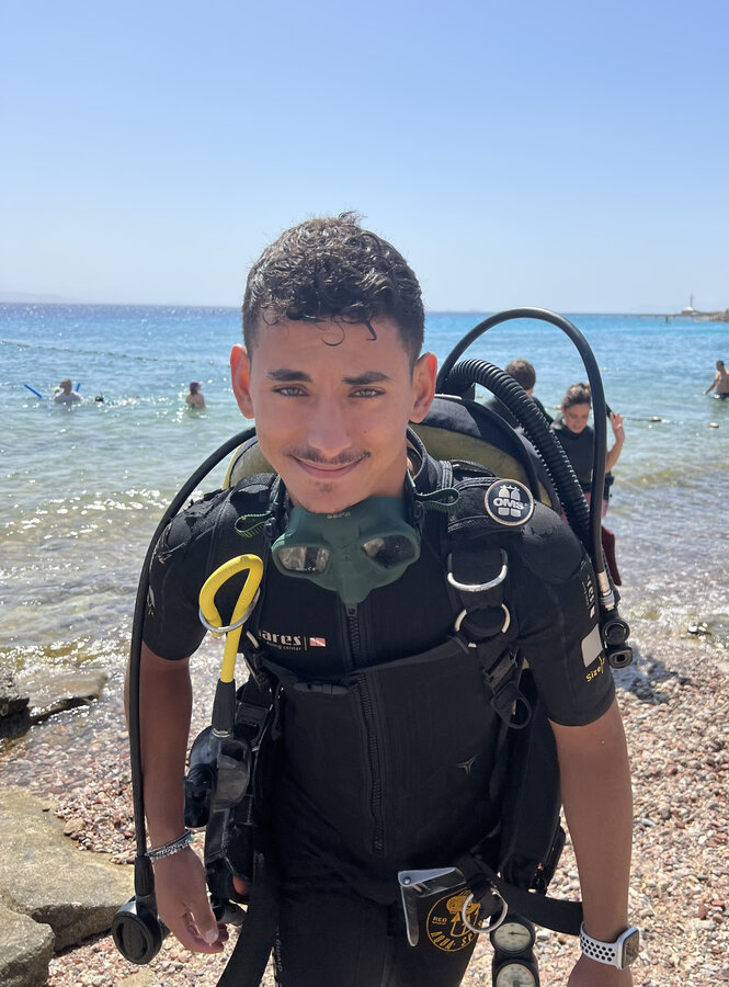 Dor Zalalihin on the shore after a dive