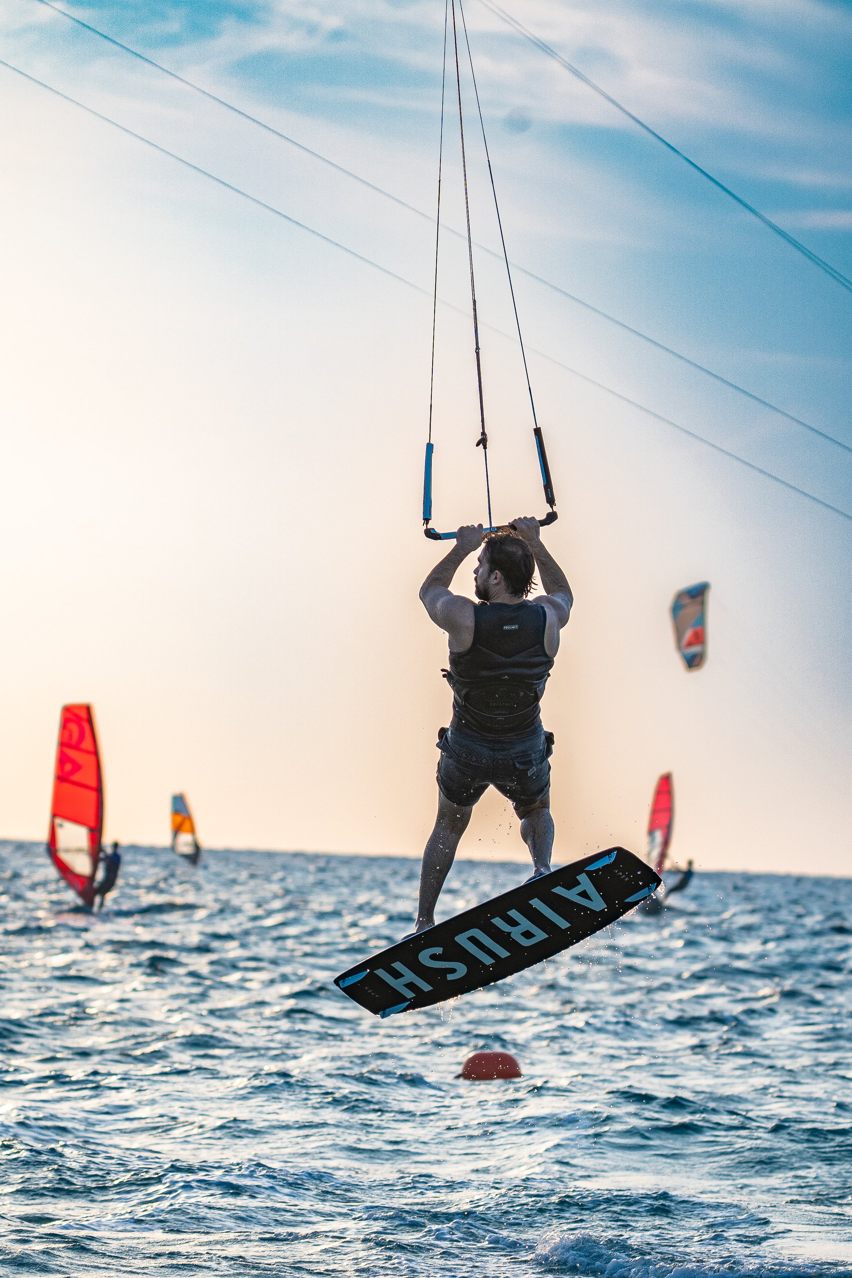 Kitesurfer suspended under the canopy